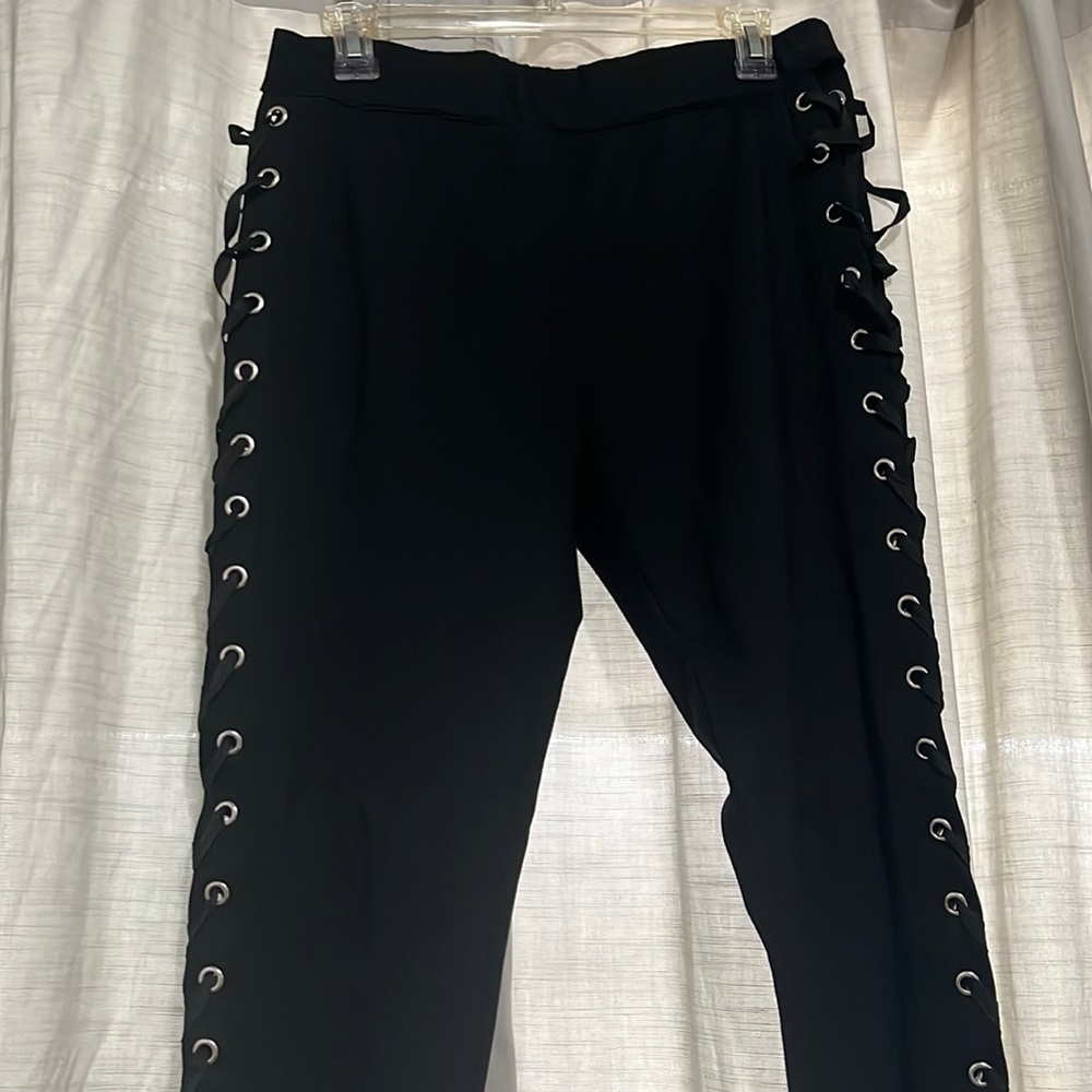 Black side tie pants. Looks sexy worn. Shoes skin